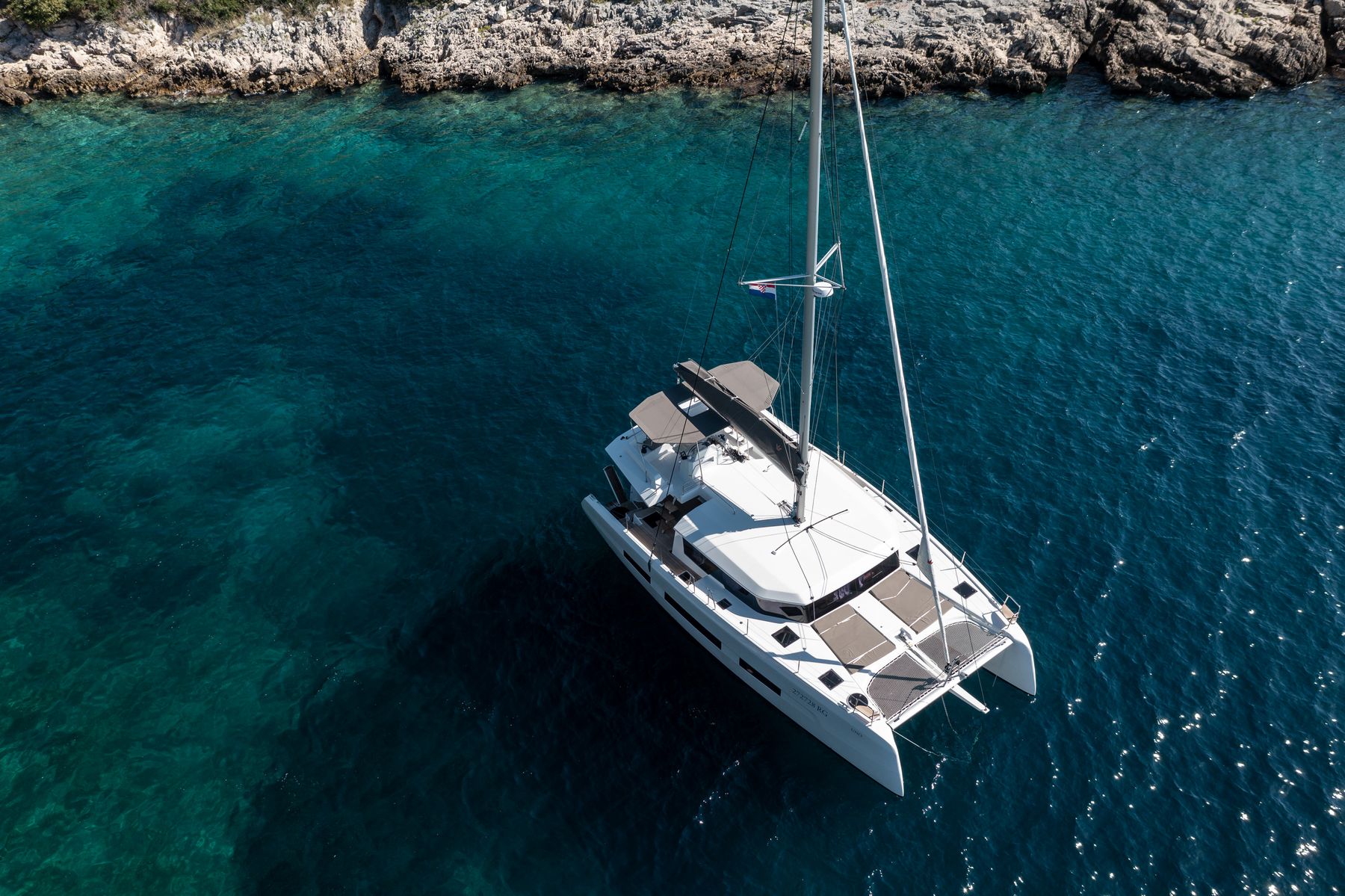 Barchetta VII anchored in a quiet cove